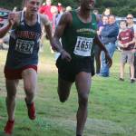 Mount Sis Paul Talens, left, finishes second to Redmonds Dereje Himbago in the junior boys two-mile race at the KingCo Jamboree on Sept. 11 at Lake Sammamish State Park. Andy Nystrom/ staff photo