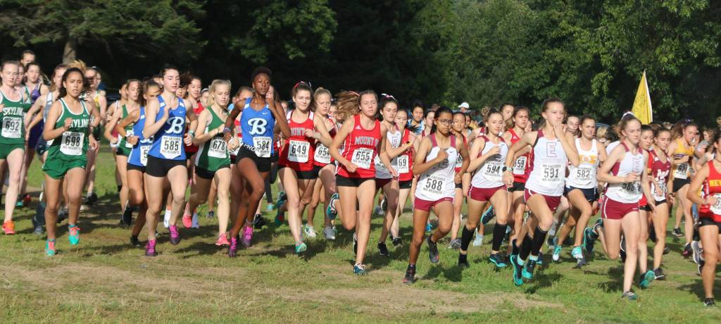 In the middle, Mount Si sophomores Olivia Ferreri (649), Lizzy Totten (654) and Ravenna Vaden (655) start amongst the pack at the KingCo Jamboree. Andy Nystrom/ staff photo
