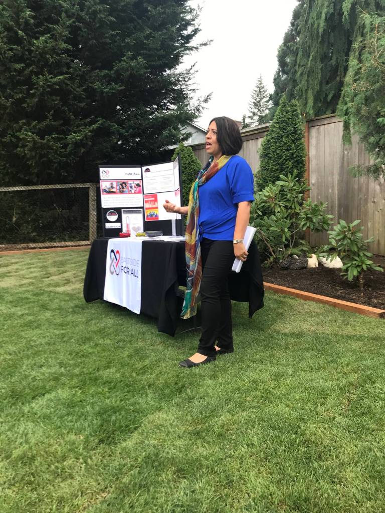 Photos by Samantha Pak/staff photo                                Debbie Lacy, founder and CEO of Eastside for All addresses the crowd at the organizations launch.