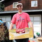 Photos by Stephanie Quiroz/staff photo                                Greg Giuliani outside of his home, ready to press apples for the season.