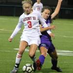 Mount Sis Sarah Creighton (3) and North Creeks Maddy Chriest battle for the ball on Oct. 1 at Pop Keeney Stadium. The match ended in a 0-0 draw. Andy Nystrom/ staff photo