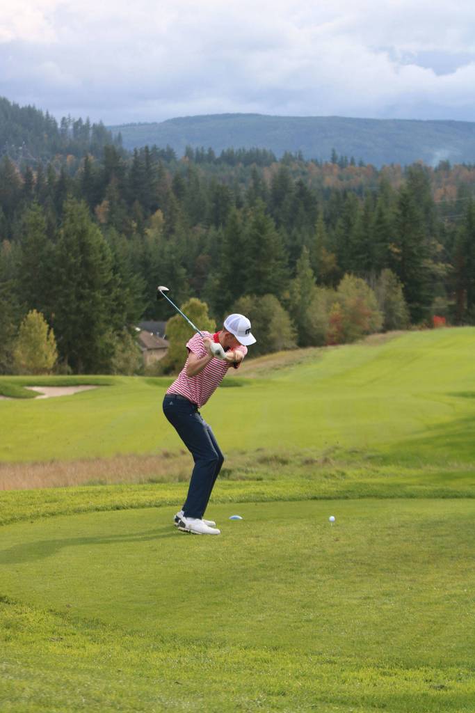 Mount Sis Robert Nielsen tees off on the first hole on Oct. 3. Andy Nystrom/ staff photo
