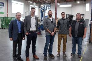 Natalie DeFord/Staff photo                                A group tours the facilities at Allegion (Technical Glass Products) during the companys Manufacturing Day event. From left, Snoqualmie city administrator Bob Larson, Casey Duff from Sen. Maria Cantwells office, production manager Dave Jensen, Mount Si High School senior Dylan Van Vleet, Mount Si teacher Gregg Meyers.