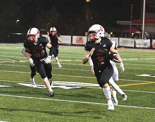 Mount Si wide receiver Colby Botten returns a punt 41 yards for a touchdown in the Wildcats 55-7 victory over Skyline on Oct. 18. Photo courtesy of Calder Productions