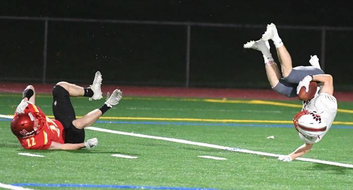 Mount Sis Andrew Mostofi finishes off one of his three touchdown catches during the Wildcats 29-14 victory over Newport on Oct. 25. The game was called at halftime due to multiple first-half lightning strikes. Mount Si (3-1, 6-2) will play Inglemoor in the 4A KingCo playoffs at 7:30 p.m. Saturday at Pop Keeney Stadium. Photo courtesy of Calder Productions