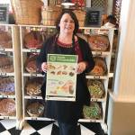Snoqualmie Falls Candy Shoppe owner Marsha Harris poses after enrolling her business in composting services through a program offered by the City of Snoqualmie and Waste Management. Businesses can join the limited time assistance program through the end of the year. Courtesy photo