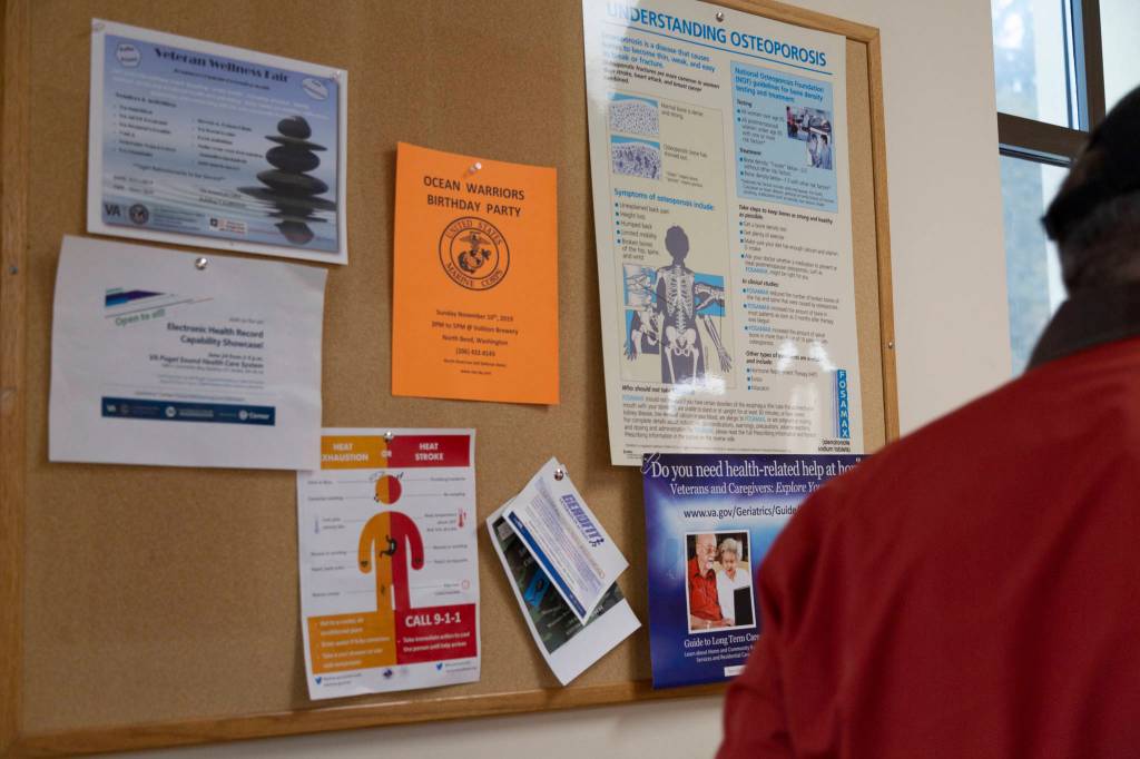 A sign hangs on the bulletin board at the VA medical center for the Ocean Warriors Birthday Party. Curtis hung others, like these, in areas with many eyes to see.