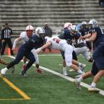 Mount Sis Caleb Dalgleish (24) provides a hit that resulted in a safety. Photo courtesy of Calder Productions