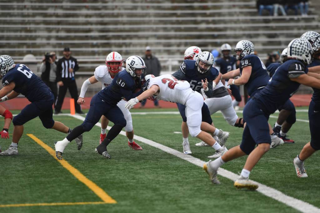 Mount Sis Caleb Dalgleish (24) provides a hit that resulted in a safety. Photo courtesy of Calder Productions