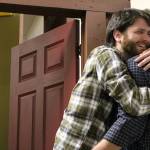 Ryan Hartwell (Fred) hugs Tim Platt (Scrooge) in the final scene of VCSs production of A Christmas Carol. Madison Miller / staff photo