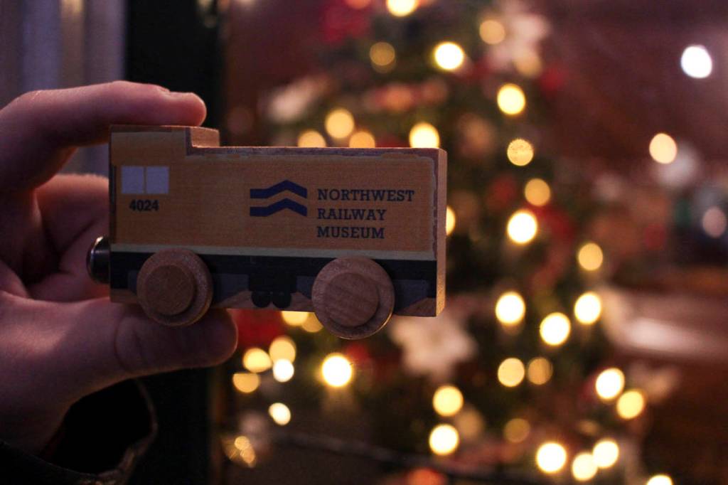 Each child who rode the Santa Train got a toy train from Saint Nick. Natalie DeFord/staff photo.