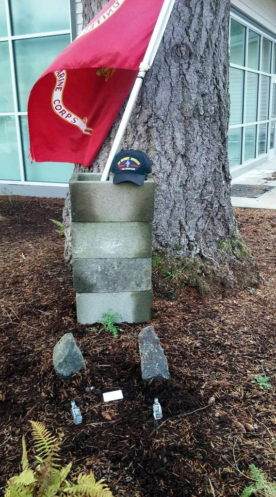 photo courtesy of Jim Curtis                                A makeshift memorial sits outside North Bend City Hall during a memorial march held in memory of veterans Andrew Yoder and Travis Corbet. They were killed last spring when a crane collapsed in Seattle.