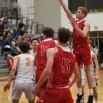 Mount Sis Jabe Mullins rises above the pack for a shot against Issaquah on Jan. 7. The Wildcats won, 53-39. Mullins led the Wildcats with 18 points. Mount Si (10-3 overall at press time) raised its league record to 7-0 at press time following wins over Woodinville, 58-44, on Jan. 10 and Inglemoor, 55-46, on Jan. 11. Courtesy of Calder Productions