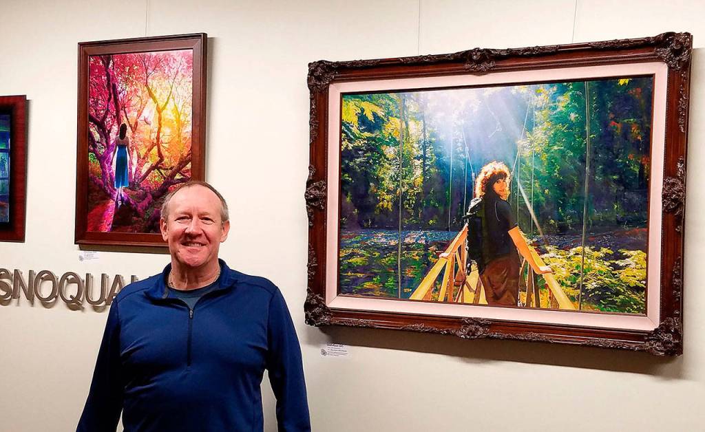 Courtesy photo                                Artist Mike Winterbauer at a showing of his artwork in Snoqualmie City Hall.