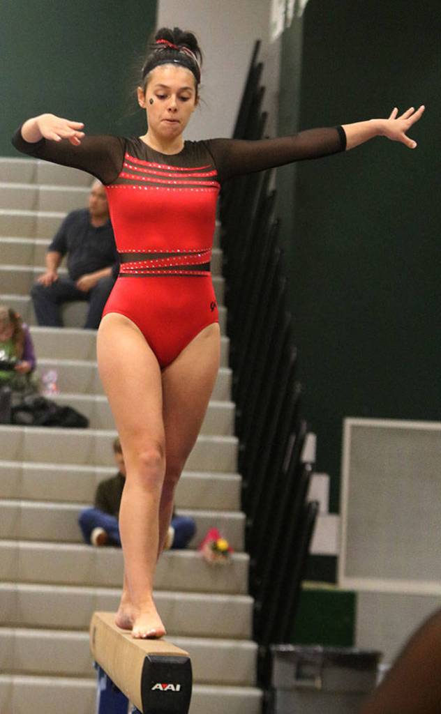Lauren Bennetts concentrates on the balance beam on Jan. 23 at Skyline High. Andy Nystrom/ staff photo