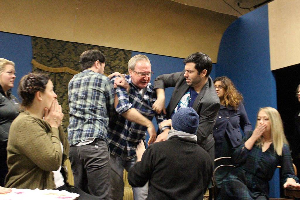 Margaret Zatloukal, Ryan Hartwell, Peter Cook, Michael Schmidt, and Chris Clark rehearse for VCSs production of Murder on the Orient Express. Madison Miller/staff photo