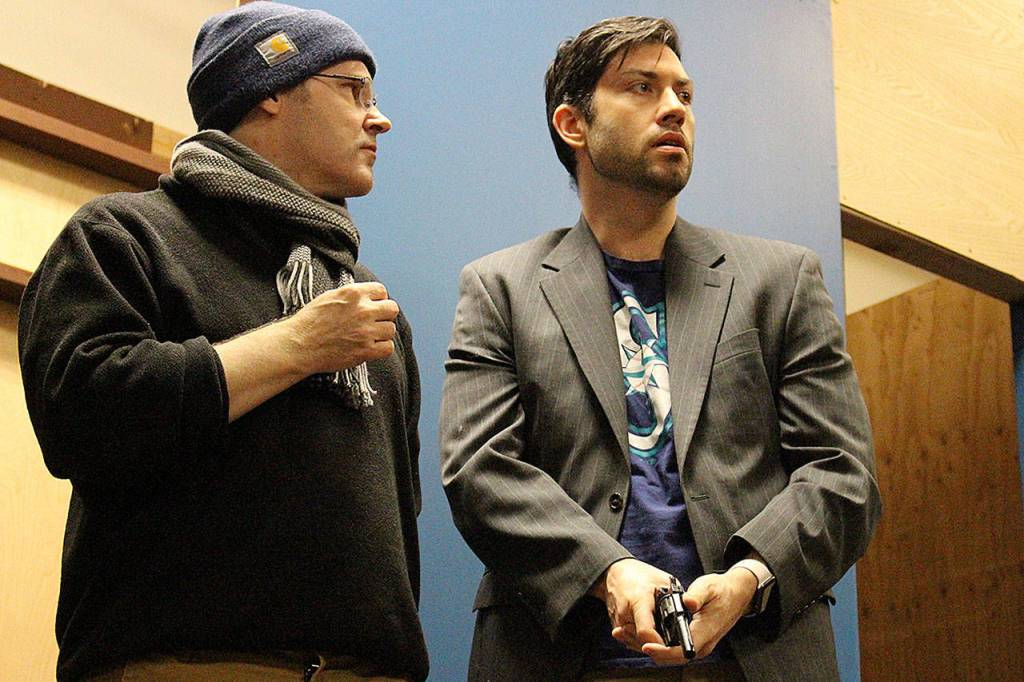 Madison Miller/staff photo                                Michael Schmidt stars as Hercule Poirot and Chris Clark as M. Bouc in VCSs production of Murder on the Orient Express.