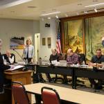 Snoqualmie City Clerk Jodi Warren swears in re-elected councilmembers Katherine Ross and Sean Sundwall at the Jan. 27 city council meeting. Courtesy photo