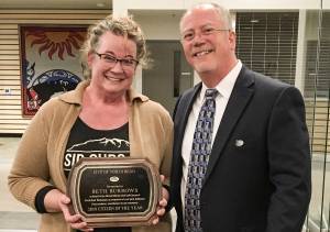 Courtesy photo                                North Bend Mayor Rob McFarland (R) presents the 2019 Citizen of the Year award to North Bend resident Beth Burrows at the citys Feb. 4, 2020 council meeting.