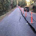 Landslide creates crack in Fall City road, allowing for a one lane entry and exit. Courtesy of King County Road Services