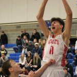 Mount Si senior Hayden Curtiss throws down a dunk during a district playoff game against Woodinville on Feb. 15. Benjamin Olson/staff photo
