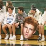 Mount Si fans prepare for the Wildcat boys game on Feb. 20 at Jackson High. One fan holds a cardboard cutout of player Jabe Mullins. Andy Nystrom/ staff photo
