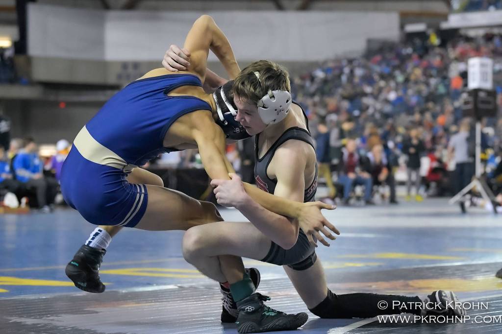 Mount Sis Mark Marum, right, battles Decaturs Colin Jack at Mat Classic XXXII. Photo courtesy of Patrick Krohn