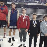 Mark Marum, third from left, receives his fourth-place medal at state. Andy Nystrom/ staff photo