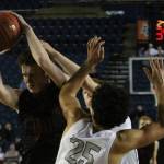 Mount Sis Jack Williams snags a rebound against Glacier Peak in the 4A state semifinals on Friday at the Tacoma Dome. Andy Nystrom/ staff photo