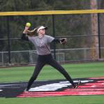 Molly Wilbourne makes a play in center field during a March 10 practice on the teams new turf field. Andy Nystrom/ staff photo