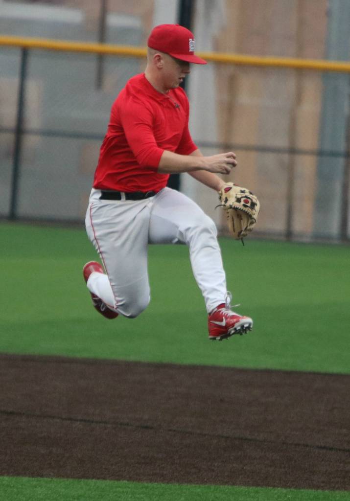 Mount Si shortstop Troy Baunsgard gets some air while making a play during a March 10 practice on the teams new turf field. Andy Nystrom/ staff photo