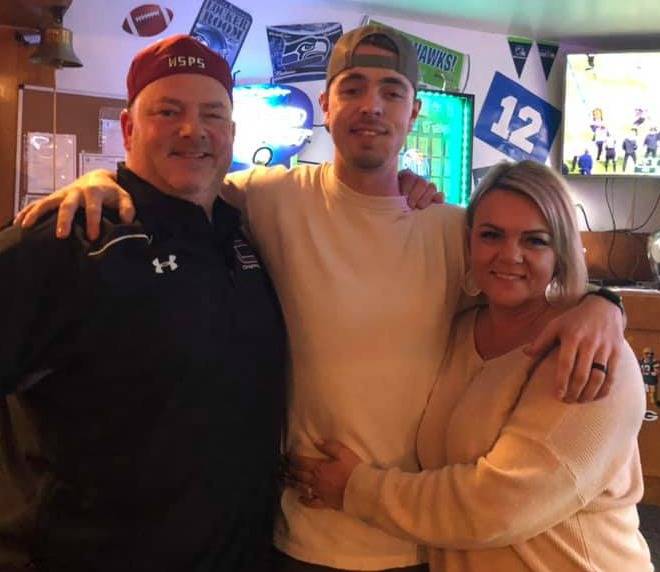 From left, Steve, Tanner and Trish Simpson at Tanners going-away party to play baseball in Germany. Courtesy photo
