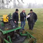 Auburn Mountain View Cemetery Manager Craig Hudson, center, confers with maintenance workers David Partridge, left, and Zach Hopper in March 2020. Sound Publishing file photo