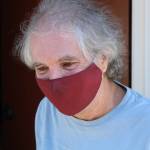 Robert Allen, 61, pictured outside his room at the North Bend Motel in August 2020. Aaron Kunkler/staff photo