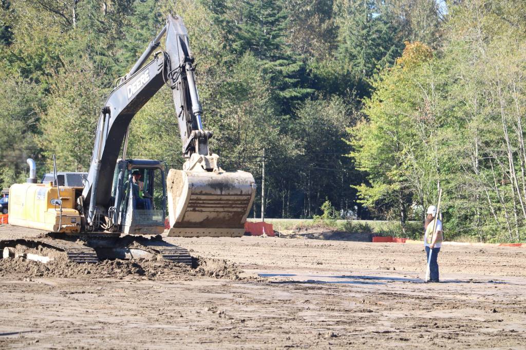 Aaron Kunkler/staff photoA construction crew works on the site of the new Snoqualmie Valley Athletic Center in North Bend on Oct. 6. Construction began in September on the multi-field sports complex. It is expected to be completed in May 2021, and provide space for four Little League baseball fields, or two soccer, football or lacrosse fields. The baseball fields will be able to accommodate high school, junior league and softball teams. In other athletics news, the Sno-King Snoqualmie ice hockey rink is also hosting grand opening on Oct. 18.