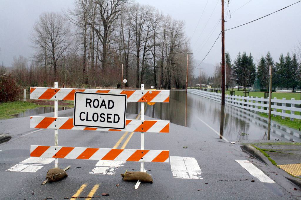 A road closure due to flooding on SE Park Street, Snoqualmie, during the 2016 flood. File photo