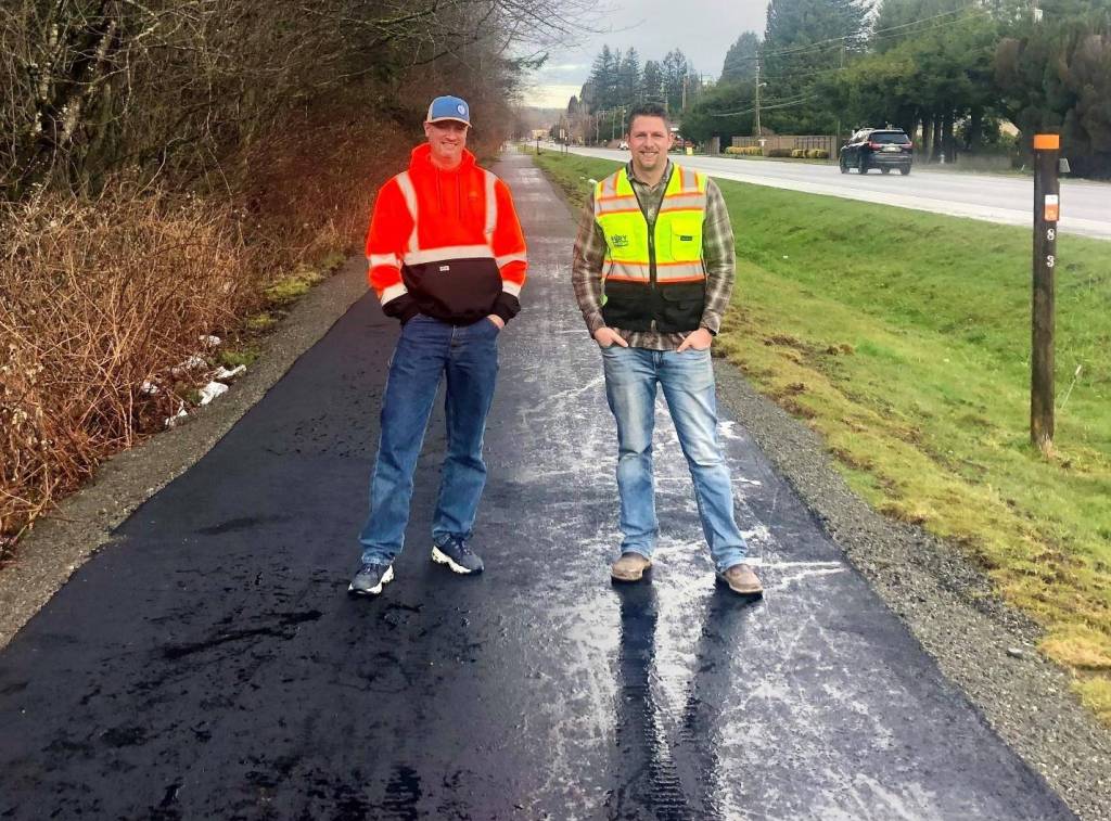 Tom Merry of Rainier Asphalt and Mike Day of Fury Site Works on the new Tanner Trail extension. Contributed by North Bend