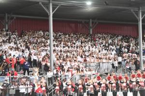 Masked spectators watch Mount Sis Sept. 10 football game against Yelm High School. Photo Courtesy of Calder Productions.