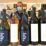 Chris Stone and the Pearl and Stone wine selection. Photo by William Shaw/Valley Record