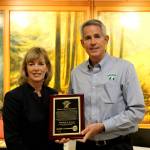Courtesy photo
Snoqualmie Mayor Matt Larson (right) receives a lifetime service award and key to the city from Councilmember and Mayor-elect Katherine Ross on Dec. 13.