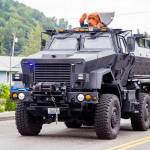 Snoqualmie Police Department houses a surplus military mine-resistant armored personnel carrier. It is seen here during a 2016 parade in Algona. Courtesy photo.
