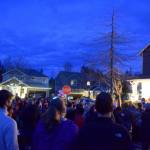 Christmas carolers, led by Valley Center Stage, sing to Zander Wainhouse and his family outside their house in Snoqualmie on Nov. 29. Zander was diagnosed with brain cancer in Dec. 2020. Photo Conor Wilson/Valley Record