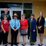 Community leaders gather outside Encompass’ new Child Development Center on Aug. 19 for the building’s grand opening. From left: State Rep. Bill Ramos, Snoqualmie Mayor Matt Larson (back), Encompass Executive Director Nela Cumming, Snoqualmie Tribal Chairman Robert de los Angeles, King County Councilmember Kathy Lambert, State Rep. Lisa Callan, Issaquah Mayor Mary Lou Pauly, North Bend Mayor Rob McFarland. File photo by Conor Wilson/Snoqualmie Valley Record