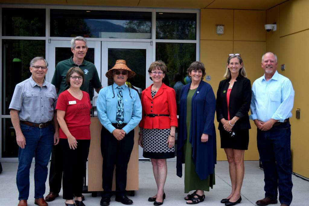 Community leaders gather outside Encompass’ new Child Development Center on Aug. 19 for the building’s grand opening. From left: State Rep. Bill Ramos, Snoqualmie Mayor Matt Larson (back), Encompass Executive Director Nela Cumming, Snoqualmie Tribal Chairman Robert de los Angeles, King County Councilmember Kathy Lambert, State Rep. Lisa Callan, Issaquah Mayor Mary Lou Pauly, North Bend Mayor Rob McFarland. File photo by Conor Wilson/Snoqualmie Valley Record