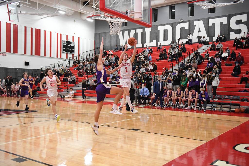 Sophomore Blake Forrest steals the ball and goes for a lay-up. Photo courtesy of Calder Productions.