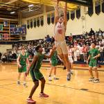Photo Courtesy of Calder Productions
Senior forward Miles Heide goes for a dunk in the KingCo Championship game against Woodinville on Feb. 5. The Wildcats beat the Falcons, 72-42, and were crowned league champions. They will be the top seed in the KingCo/WesCO district tournament.
