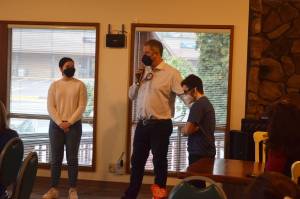 MSHS Principal John Belcher, center, talks about senior students Alie Hall (left) and Zachary Miller, who were both named Student of the Quarter by the Snoqualmie Valley Rotary Club. Photo Conor Wilson/Valley Record