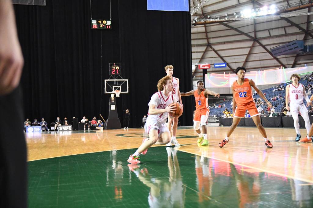 Photo courtesy of Calder Productions. Sophomore Blake Forrest goes for a layup in a state quarter-final game against Graham-Kapowsin on March. 3.