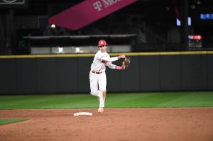 Photo courtesy of Calder Productions. Junior Parker Norah fields a grounder in a 1-1 tie against Eastside Catholic on March 19.