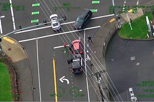 Guardian One footage from January 2022 shows an Issaquah police officer attempting to remove suspect from stolen vehicle but gets run over in the process. Courtesy of King County Sheriffs Office Air Support